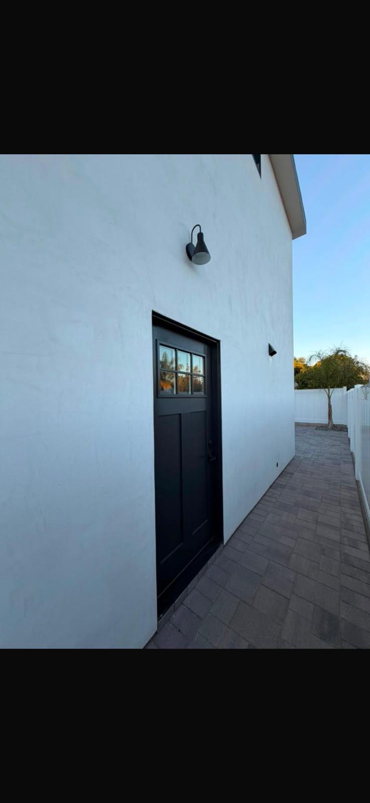 Modern side entry black door